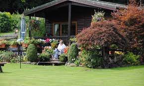 Lady sitting outside her chalet