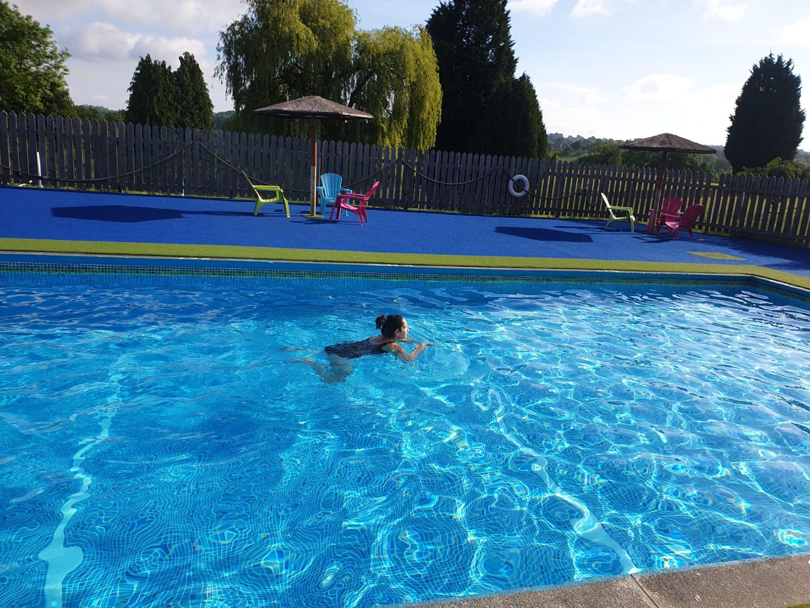 lady in the bank farm swimming pool