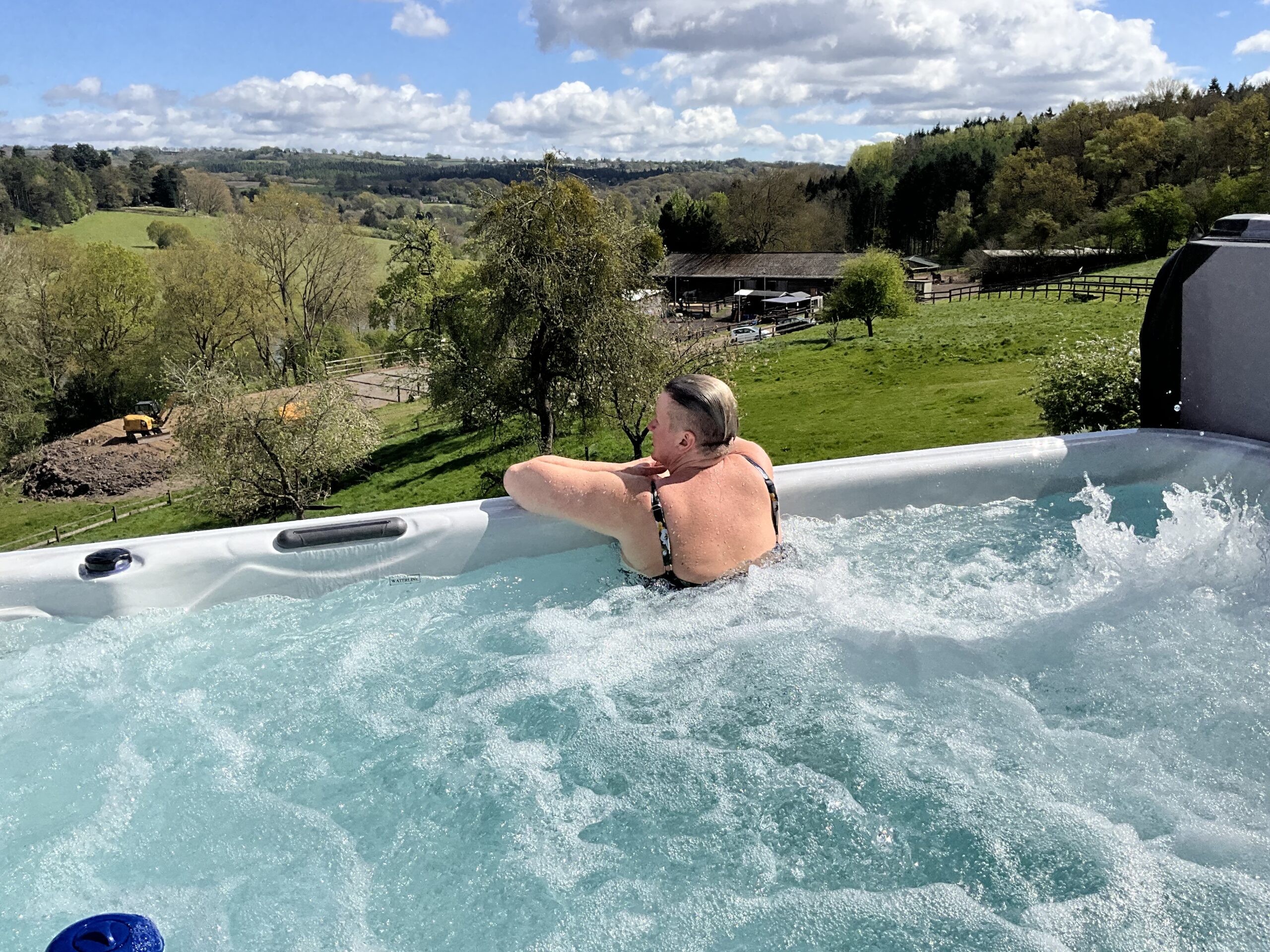 lady in swim spa at bank farm