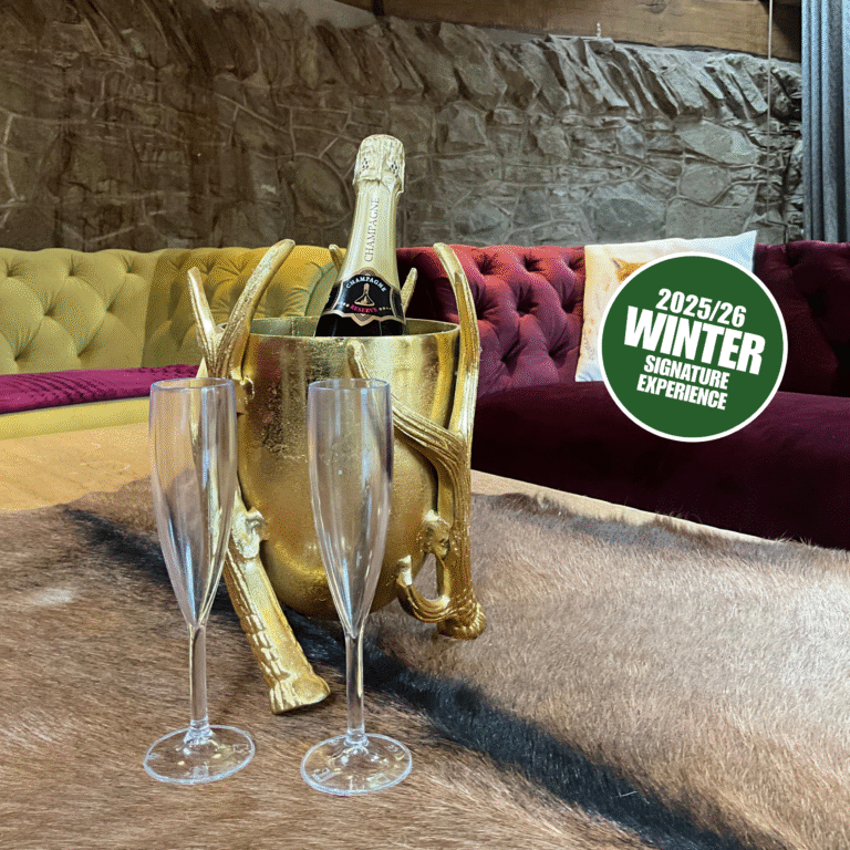 bootle of prosecco in the glamping lodge at bank farm equestrian